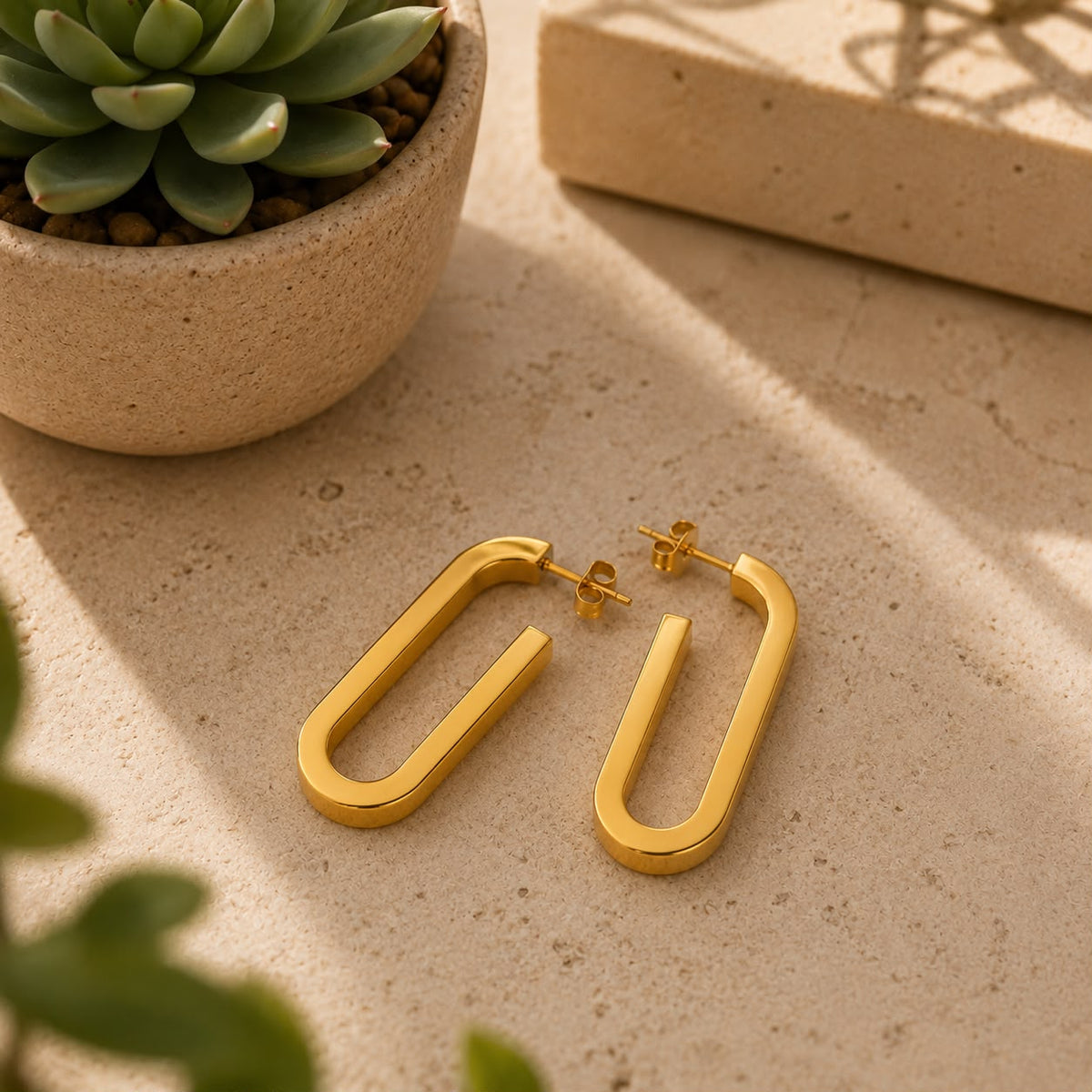 Modern Elongated Gold Hoop Earrings